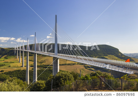 Multi-span cable stayed Millau Viaduct across gorge valley of Tarn River, Aveyron Departement, France Multi-span cable stayed Millau Viaduct across gorge valley of Tarn River, Aveyron Departement, France 86097698