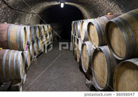 Wine cellars with barrels, traditional wine called Bikaver near Eger, Hungary 86098047