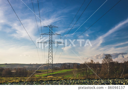High voltage electric pillars against the sky High voltage electric pillars against the sky 86098137
