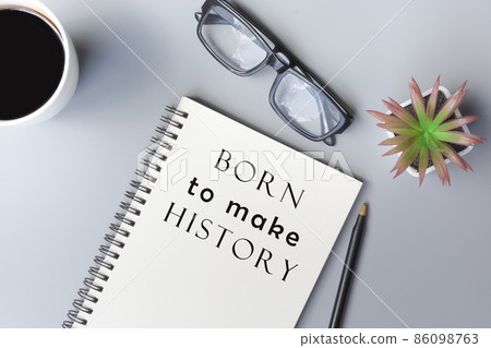 Motivational and inspirational quote on notepad. Top view Motivational and inspirational quote on notepad. Top view 86098763