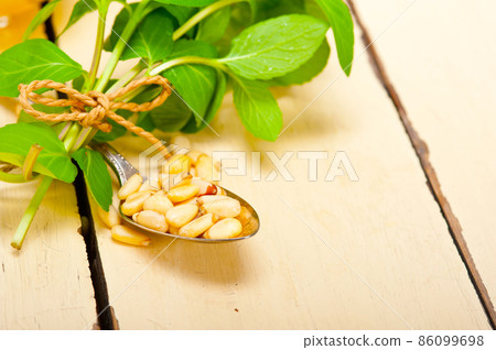 Arab traditional mint and pine nuts tea Arab traditional mint and pine nuts tea 86099698