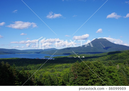 View of Mt. Oakan and Lake Akan from the Lake Akan Observatory in Kushiro City, Hokkaido View of Mt. Oakan and Lake Akan from the Lake Akan Observatory in Kushiro City, Hokkaido 86099989
