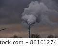 Air pollution, closeup of one big smoking pipe on the winter sky 86101274
