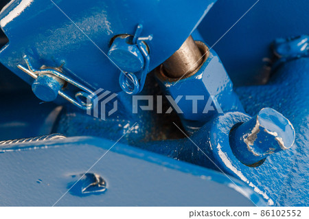 close-up view on hydraulic valve and piston of floor car jack 86102552