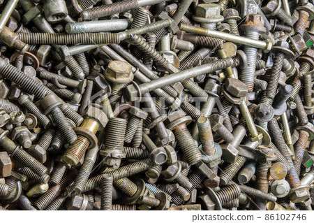 full frame background of used automobile bolts heap, old and dirty full frame background of used automobile bolts heap, old and dirty 86102746