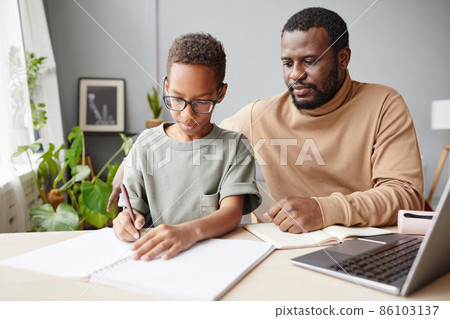 Father Homeschooling Son Father Homeschooling Son 86103137