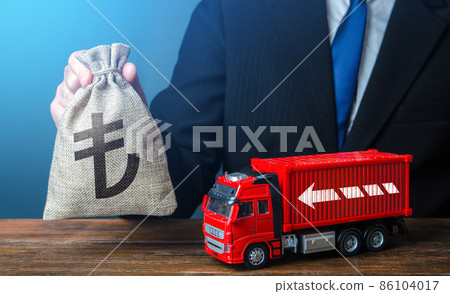 Businessman with turkish lira money bag and truck. Good salaries for drivers. Rising prices, global containers shortage crisis. Logistics. High income of transporting goods. Businessman with turkish lira money bag and truck. Good salaries for drivers. Rising prices, global containers shortage crisis. Logistics. High income of transporting goods. 86104017