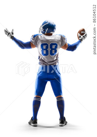 American Football player holding the ball in his hand. Joy in football. Sport emotions. Sport victory. Back view. Isolated on white background American Football player holding the ball in his hand. Joy in football. Sport emotions. Sport victory. Back view. Isolated on white background 86104512