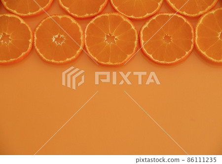 Tangerine slices and copy space Tangerine slices and copy space 86111235