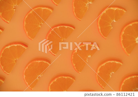 Half slices of mandarin oranges lined up on one side Half slices of mandarin oranges lined up on one side 86112421