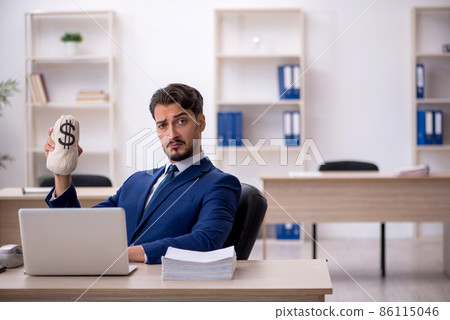 Young male employee working in remuneration concept 86115046