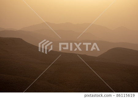 Mountain landscape, desert. Colorful sandstone. National Park Makhtesh Ramon Crater in Negev desert, Israel Mountain landscape, desert. Colorful sandstone. National Park Makhtesh Ramon Crater in Negev desert, Israel 86115619