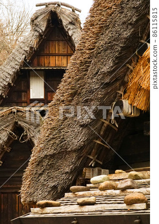 The roof of an old folk house reminiscent of the old hometown The roof of an old folk house reminiscent of the old hometown 86115815