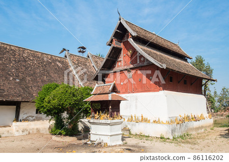 The ancient building in Lanna style located in the area of Wat Phra That Lampang Luang an iconic Buddhist temple in Lampang province of Thailand. The ancient building in Lanna style located in the area of Wat Phra That Lampang Luang an iconic Buddhist temple in Lampang province of Thailand. 86116202