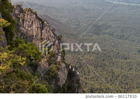 Pagoda on top of the cliff high mountain at Chaloem Phrakiat Phrachomklao Rachanuson temple (Wat Phrabat Pu Pha Daeng). 86117810