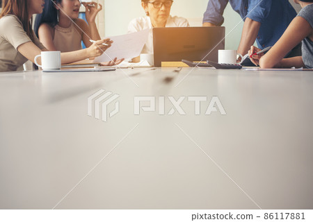 Diversity multiethnic team group of business people Present meeting conference room brainstorming business graph, chart. Multicultural Teamwork collaborate business team meeting together trust partner 86117881