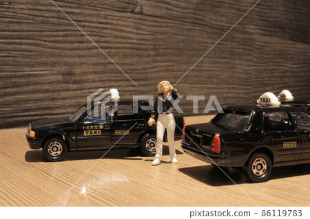 a small figure with the japan taxi 86119783