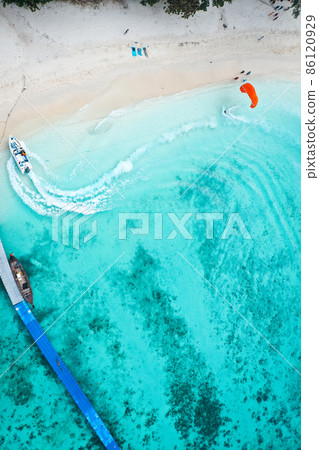 Coral island, koh He, beach and boats in Phuket province, Thailand 86120929