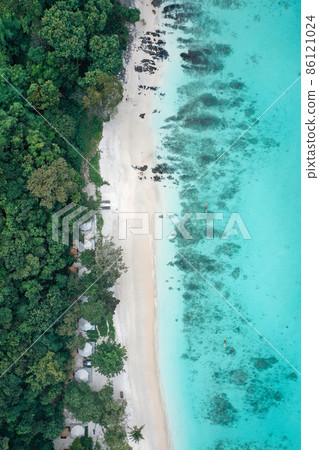 Coral island, koh He, beach and boats in Phuket province, Thailand 86121024