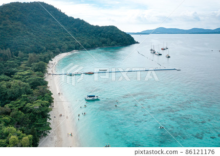 Coral island, koh He, beach and boats in Phuket province, Thailand 86121176