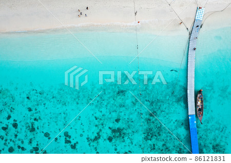 Coral island, koh He, beach and boats in Phuket province, Thailand 86121831