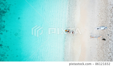 Coral island, koh He, beach and boats in Phuket province, Thailand Coral island, koh He, beach and boats in Phuket province, Thailand 86121832