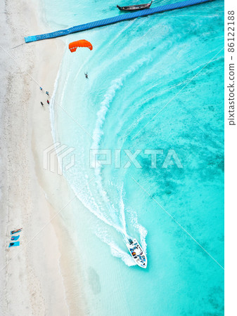 Coral island, koh He, beach and boats in Phuket province, Thailand 86122188