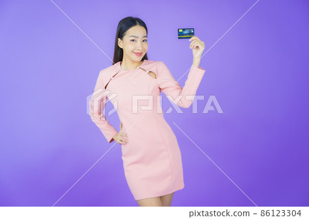 Portrait beautiful young asian woman smile with credit card Portrait beautiful young asian woman smile with credit card 86123304
