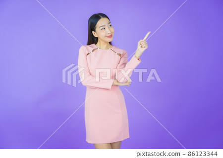 Portrait beautiful young asian woman smile with action Portrait beautiful young asian woman smile with action 86123344