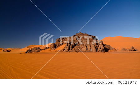 sunset view to Tin Merzouga dune at Tassili nAjjer national park, Algeria sunset view to Tin Merzouga dune at Tassili nAjjer national park, Algeria 86123978