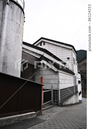 Tokyo Okutama Mitake Gorge Sake brewery and stylish black wall Traditional brewery Tokyo brewery Vertical composition Ome Line Sawai Station Unmanned station 86124353
