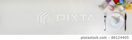 Easter table setting and dinner  festive decorations. Banner. 86124405