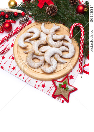 Christmas and New Year symbols and attributes of winter holidays - candy, cookies, pine cone Christmas and New Year symbols and attributes of winter holidays - candy, cookies, pine cone 86126514