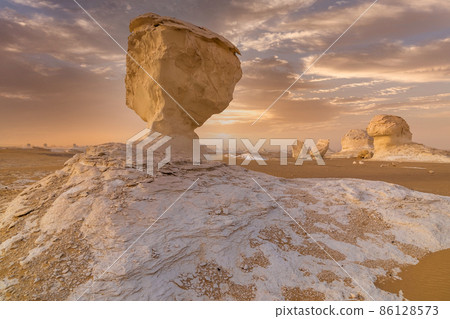 Chalk rocks in the White Desert at sunset. Egypt, Baharia Chalk rocks in the White Desert at sunset. Egypt, Baharia 86128573