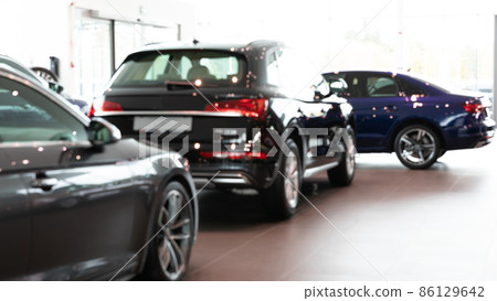 dealership selling premium SUVs, blurred photo with depth of field for background dealership selling premium SUVs, blurred photo with depth of field for background 86129642