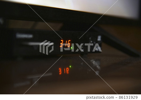 TV set-top box and TV at home TV set-top box and TV at home 86131929