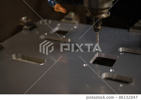 Tapping processing at the machining center Tapping processing at the machining center 86132847