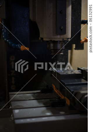 Tapping processing at the machining center Tapping processing at the machining center 86132991