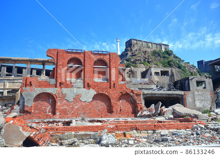 [Nagasaki Prefecture] General office of Gunkanjima in fine weather (Hashima Industrial Revolutionary Heritage) 86133246