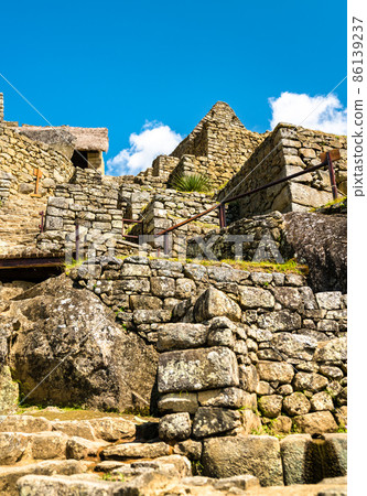 Ancient Incan city of Machu Picchu in Peru 86139237
