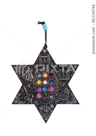 Metal silver star of David with colorful stones on white background. Metal silver star of David with colorful stones on white background. 86139748
