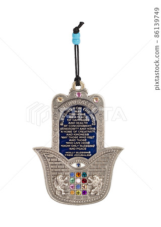 Metal hamsa for blessing isolated on white background Metal hamsa for blessing isolated on white background 86139749