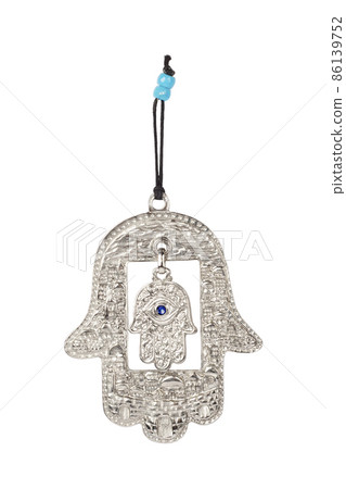 Metal hamsa for blessing isolated on white background Metal hamsa for blessing isolated on white background 86139752