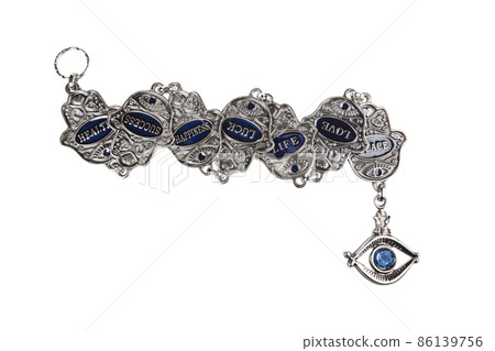 Metal hamsa for blessing isolated on white background Metal hamsa for blessing isolated on white background 86139756