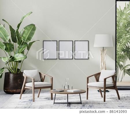 poster frames in room interior with light neutral wall with sunlight and wooden furniture with tropical plant and palm leaves, 3d rendering 86141093