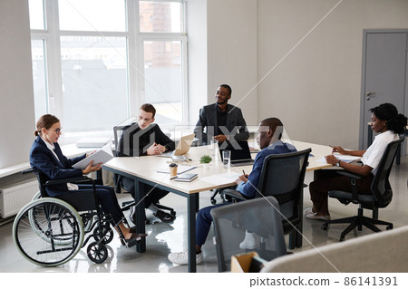 Female Leader using Wheelchair Female Leader using Wheelchair 86141391