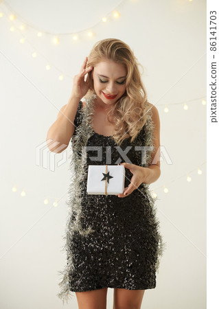 Woman with Small Gift Woman with Small Gift 86141703