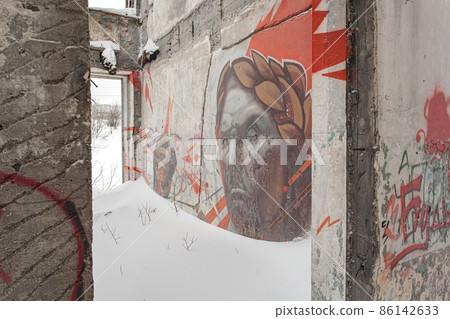 Old railway station at winter with painted walls 86142633