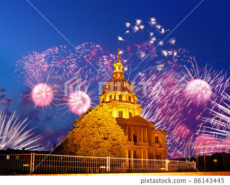 Celebratory colorful fireworks over the Les Invalides (The National Residence of the Invalids) at night. Paris, France 86143445