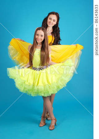 Two young girls in ballroom dress Two young girls in ballroom dress 86143633